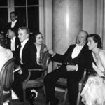 Product image: BETWEEN-THE-WARS VINTAGE POSTCARD of Winston Churchill and Charlie Chaplin